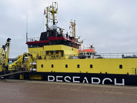 den haag, netherlands - December 27 2025: A research vessel is docked in Den Haag Netherlands. It is equipped for scientific missions and features distinct signage.