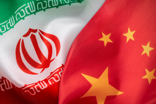 Flags of Iran and China. Concept of international relations.