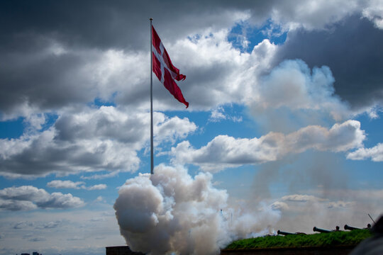 The Denmark flag among the clouds