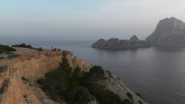 Rocky Ibiza coastline and offshore islets