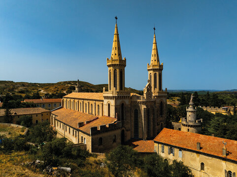 Twin church spires at Frigolet Abbey from above