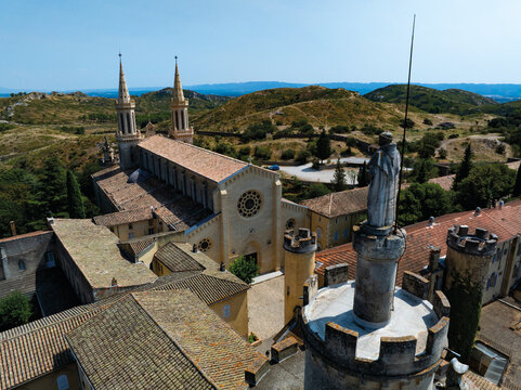 Church and foreground statue at Frigolet Abbey