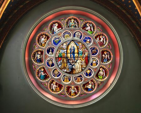 Full rose window with religious figures at Frigolet Abbey