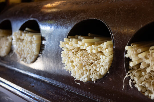 Candle dispenser in a greek orthodox church. Selective focus