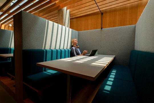 Working in a Quiet Space With Sunlight and a Laptop