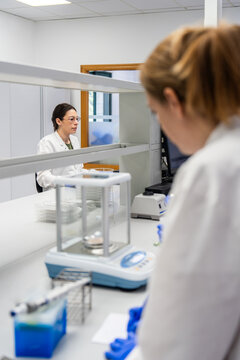 Laboratory Scene With Two Scientists Working on Experiments