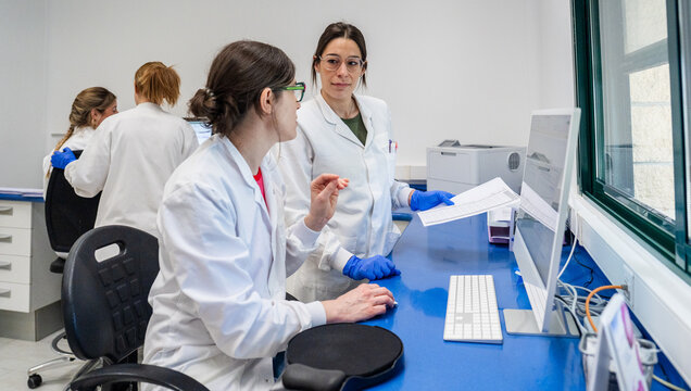 Medical Professionals Working in a Laboratory Setting