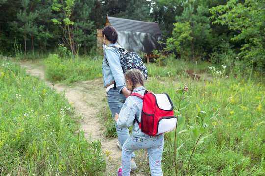 Outdoor activity with a child with Down syndrome at a camp