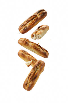 Freshly baked baguettes floating in air.