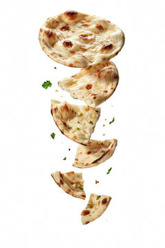Indian naan bread falling with fresh coriander.