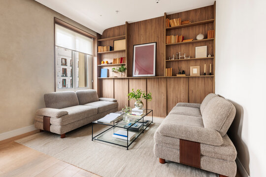 Living room sofas and glass table