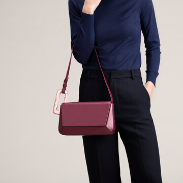 Navy Sweater With Burgundy Handbag