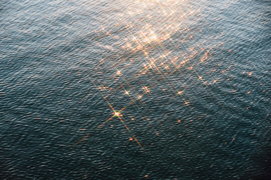 Starry Reflections on Blue Water