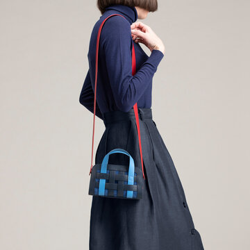 Stylish Turtleneck Fashion With Blue Handbag
