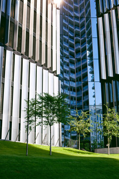 Futuristic Metallic Architectural Building Surrounded by Landscape