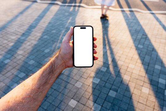 White Screen Phone at a Paved Plaza
