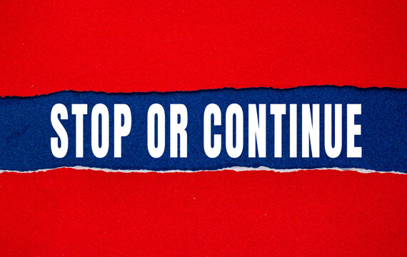 Stop or Continue text concept photo