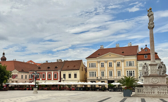 Marian Column with historic buildings in Szechenyi Square in the old town of Gyor, Hungary