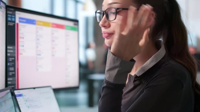 Agile Project Manager Reviews Scrum Board Tasks