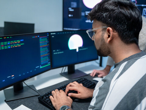 Software engineering use computer working develop AI office are assisting algorithm systems or verifying code. Programmer teamwork using artificial intelligence on laptop analysis or writing coding