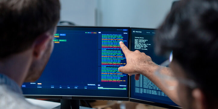 Software engineering use computer working develop AI office are assisting algorithm systems or verifying code. Programmer teamwork using artificial intelligence on laptop analysis or writing coding