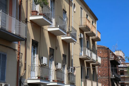 Catania city in Sicily, Italy. Generic residential neighborhood, average contemporary apartment building.