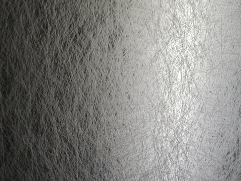 white chopped strand fiberglass mat texture. Target: industrial composite materials, construction reinforcement backgrounds, synthetic fiber textures, and filter media design concepts