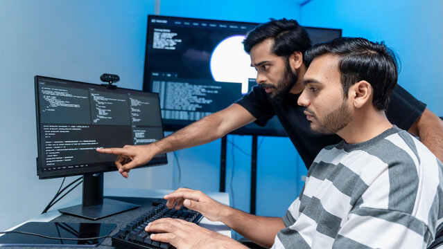 Software engineering use computer working develop AI office are assisting algorithm systems or verifying code. Programmer teamwork using artificial intelligence on laptop analysis or writing coding