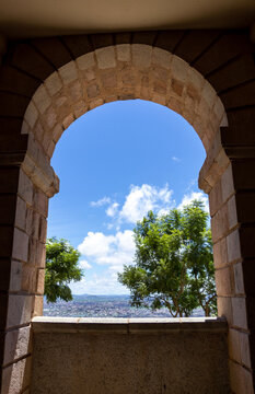 Stone Arch Framing a View Over Antananarivo from the Rova Hilltop Madagascar