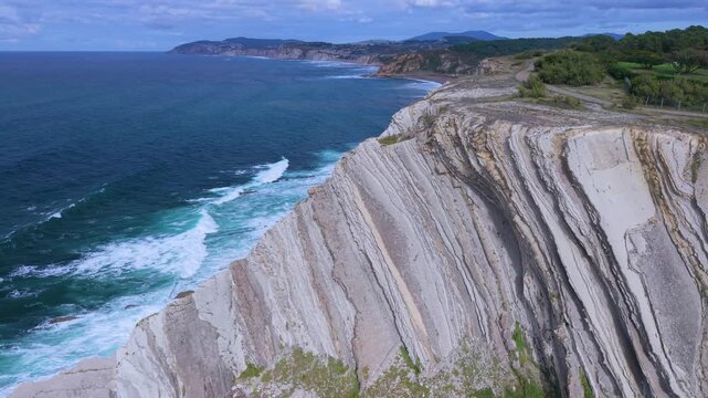 Aerial view from a drone of the Flysch of Bizkaia on the Cantabrian Sea coast between Algorta and Bakio. Province of Bizkaia. Basque Country. Spain. Europe.