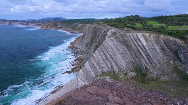 Aerial view from a drone of the Flysch of Bizkaia on the Cantabrian Sea coast between Algorta and Bakio. Province of Bizkaia. Basque Country. Spain. Europe.
