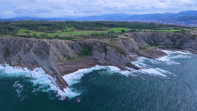 Aerial view from a drone of the Flysch of Bizkaia on the Cantabrian Sea coast between Algorta and Bakio. Province of Bizkaia. Basque Country. Spain. Europe.
