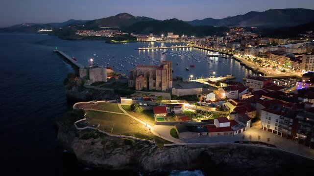 Aerial view from a drone of the Castro Urdiales port, the Church of Santa Mar&iacute;a, and the Santa Ana Castle Lighthouse. Castro Urdiales Municipality. Cantabrian Sea. Cantabria. Spain. Europe.