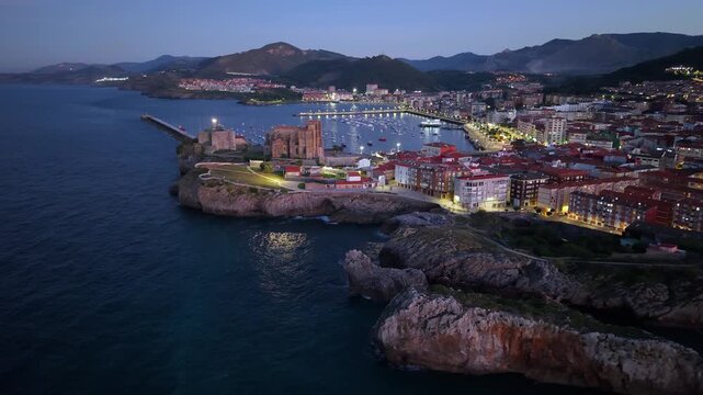 Aerial view from a drone of the Castro Urdiales port, the Church of Santa Mar&iacute;a, and the Santa Ana Castle Lighthouse. Castro Urdiales Municipality. Cantabrian Sea. Cantabria. Spain. Europe.