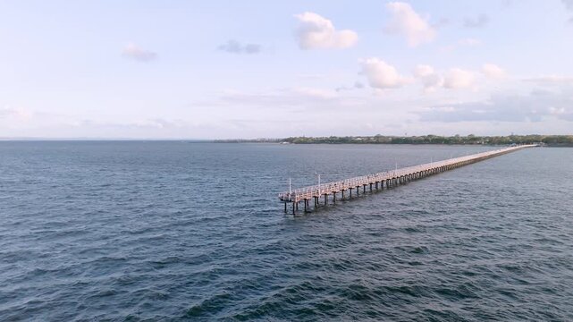 Aerial Orbit of Urangan Pier at Sunset in Hervey Bay Australia
