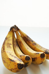 Ripe spotted bananas ideal for baking banana bread, copy space  © honey