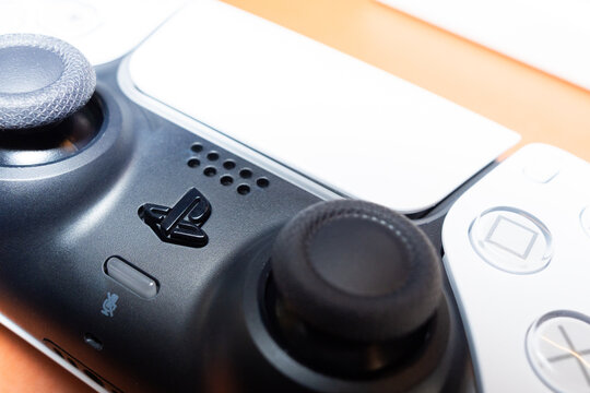 Yerevan, Armenia - 09.18.2026: Close-up of a white Sony PlayStation 5 DualSense wireless controller copy space. Sony PS5 gamepad.