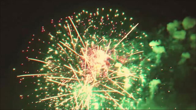 Colorful fireworks exploding in night sky celebration background stock video