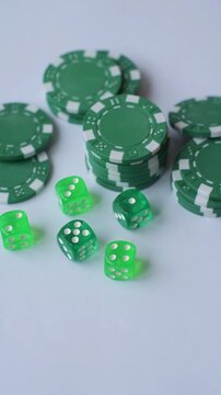Playing cards, dice and chips on a table, a gambling game of blackjack. Cards, dice and chips