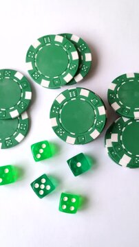 Playing cards, dice and chips on a table, a gambling game of blackjack. Cards, dice and chips