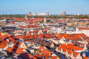 Obraz premium Munich Historic Old Town Rooftops Panorama. Munich's architectural heritage and historic urban character, colorful rooftops and traditional buildings aerial view