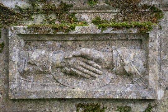 A weathered tombstone in a Cornish Churchyard