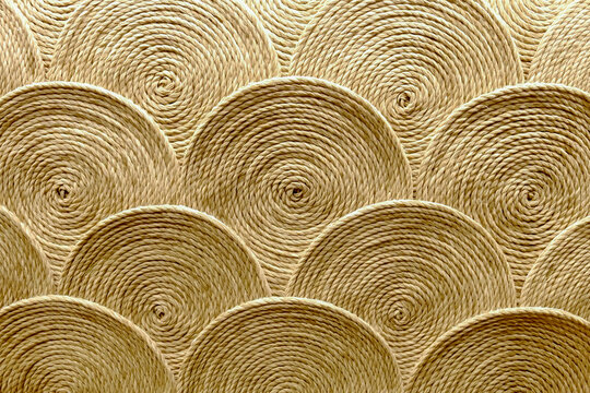 Coiled rope circles in scallop pattern texture