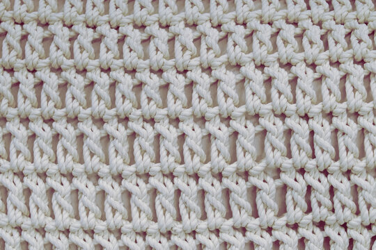 Chunky rope knit texture close-up