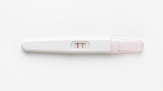 A white pregnancy test displays two lines indicating a positive result, resting on a plain light background, highlighting the moment of discovery.