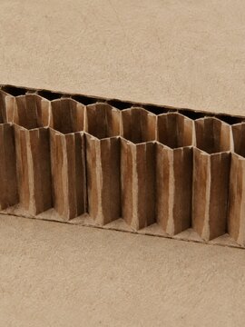 Close up macro view of honeycomb cardboard texture with hexagonal cells