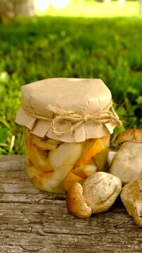 Preservation of chanterelle mushrooms in a jar. Selective focus.