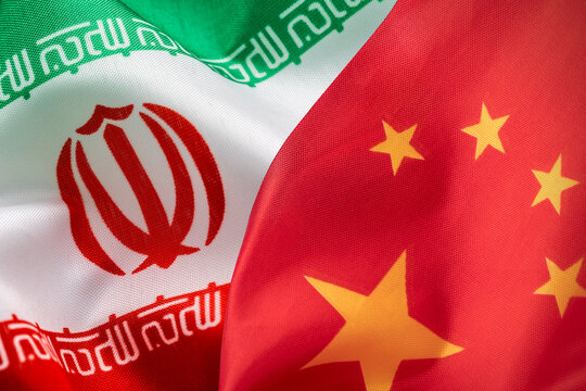 Flags of Iran and China. Concept of international relations.