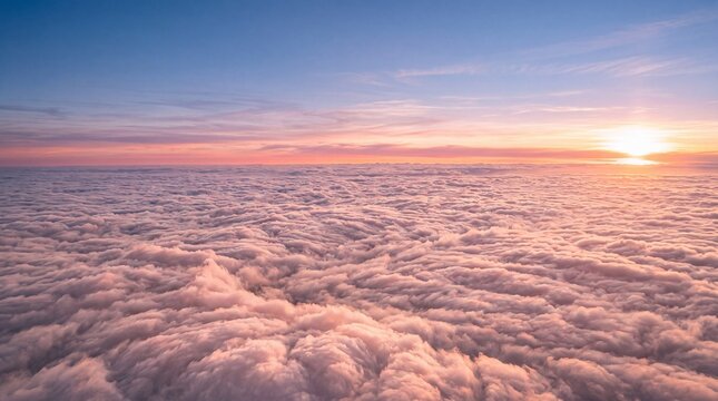 Aerial View Above Fluffy Clouds at Sunset
