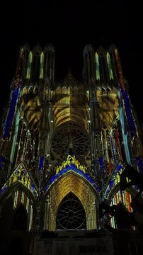 The light show Regalia on the facade of Reims Cathedral Notre-Dame de Reims. Reims, France, December 25, 2025. High quality 4k footage